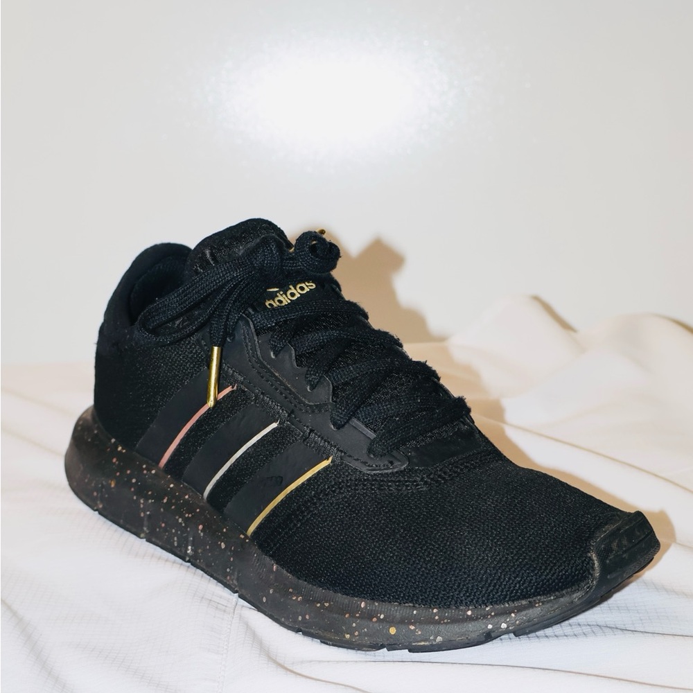 adidas Black Athletic Shoes with Gold Accents